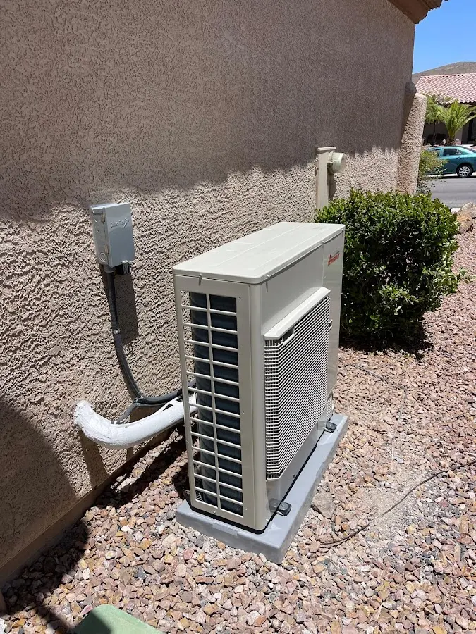 Residential air conditioning condenser unit in Brownfield